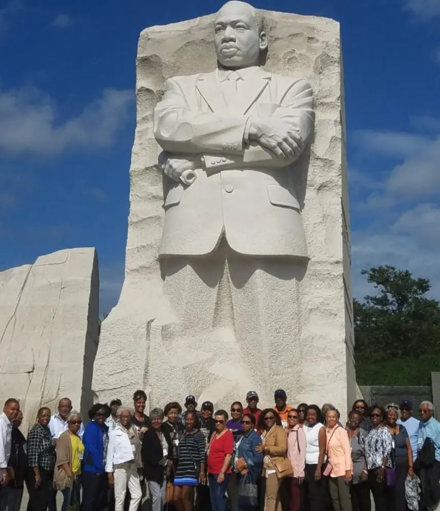 New Project - 2025-05-07T224929.114 A group of people standing in front of the martin luther king jr. Memorial